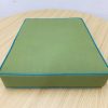 Green Trapezoid Cushion Cover with Surfy Blue Piping