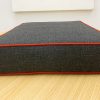 Grey Trapezoid Cushion Cover with Red Piping
